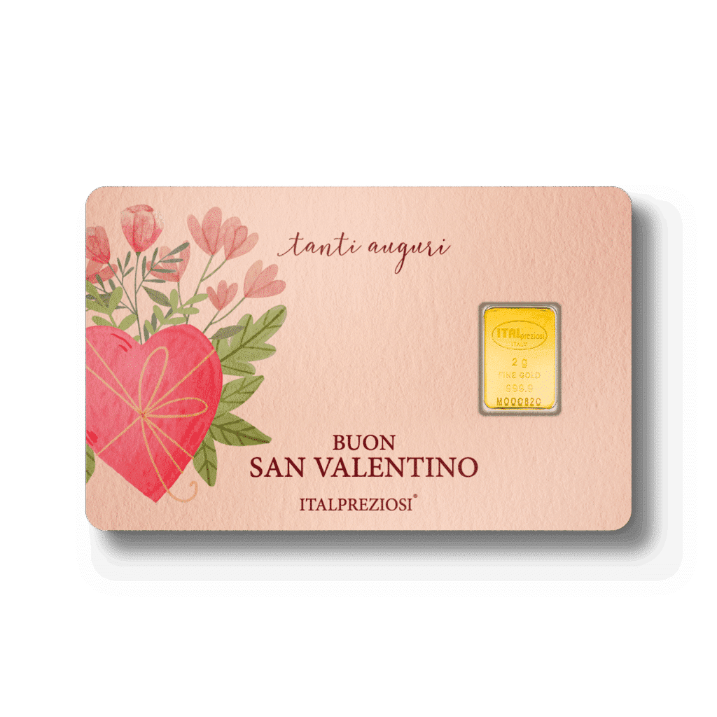 Il biglietto San Valentino presenta un cuore rosso e fiori rosa sulla sinistra, il testo italiano "tanti auguri" e "BUON SAN VALENTINO" al centro e un lingotto d'oro fino Italpreziosi da 2 g sulla destra.