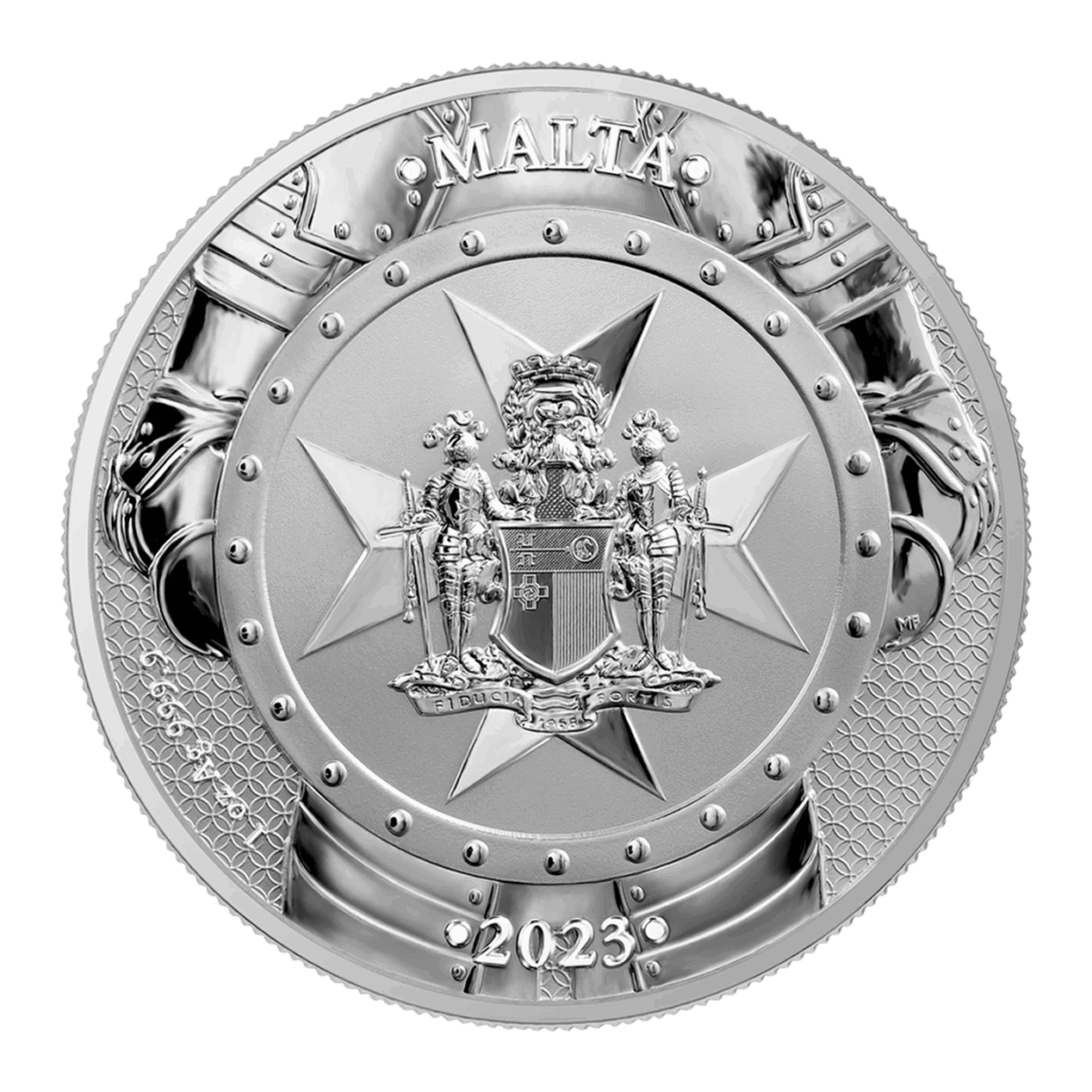 La moneta 2023 Cavalieri del Passato 5 Euro 1 oz Argento Fior di Conio è una moneta d'argento con la croce di Malta, uno stemma centrale, armature e scudi sul bordo, "MALTA" in alto e "2023" in basso.