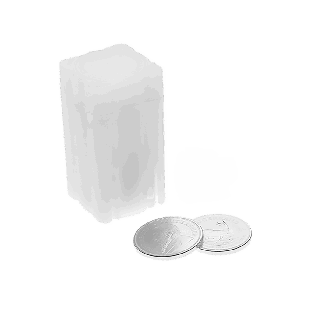 Due monete Krugerrand d'argento sono adagiate su una superficie bianca accanto a un tubo verticale di plastica bianca traslucida progettato per conservare più monete.