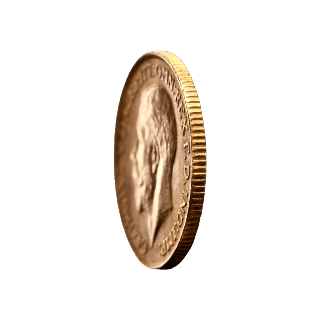 Una moneta d'oro Sterlina d'Oro - Re Giorgio V 1911-1932 si trova sul bordo, con un ritratto di profilo e un testo sulla faccia, su uno sfondo bianco con una sfocatura di movimento.