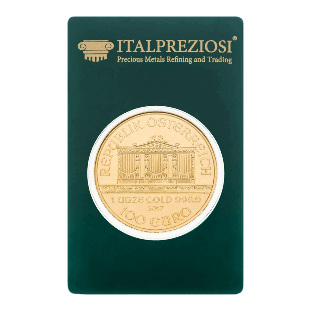 Una moneta d'oro della Filarmonica di Vienna con la scritta REPUBLIK ÖSTERREICH e 1 UNZE GOLD 999.9 100 EURO 2017 è esposta in una confezione verde Italpreziosi con la dicitura Precious Metals Refining and Trading.