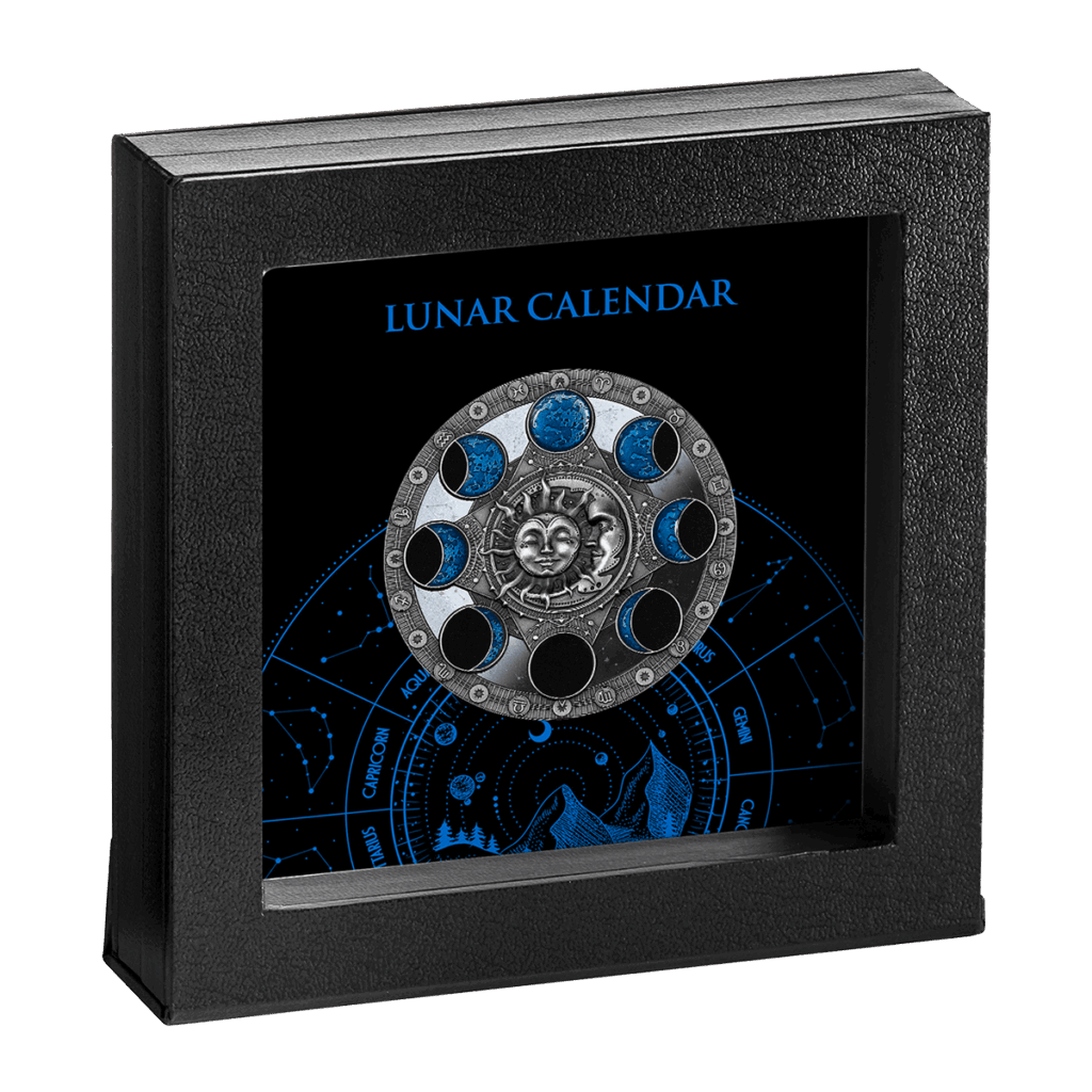 Il Calendario Lunare 2 Dollari è un cofanetto con un calendario lunare circolare metallico che mostra le fasi lunari attorno a una faccia del sole, con simboli zodiacali e il testo "Calendario Lunare".